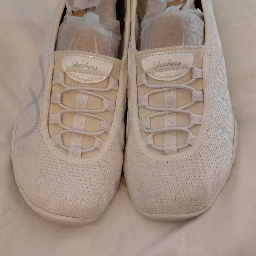 Skechers Women's White Slip-On Sneakers